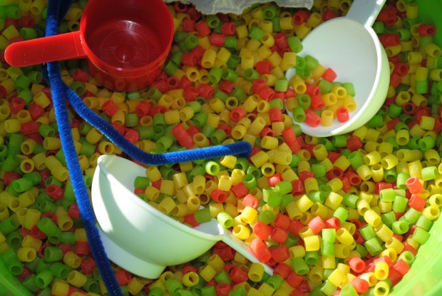 Sensory Colored Pasta Bin by Crayon Box Chronicles 