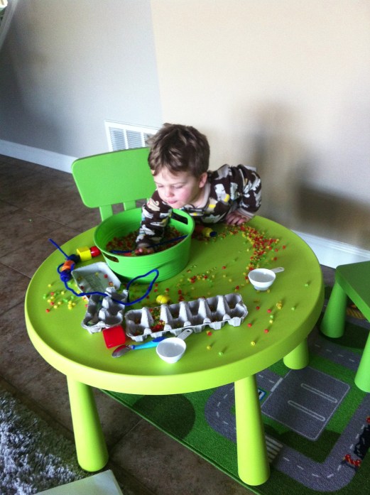 Sensory Colored Pasta Bin by Crayon Box Chronicles