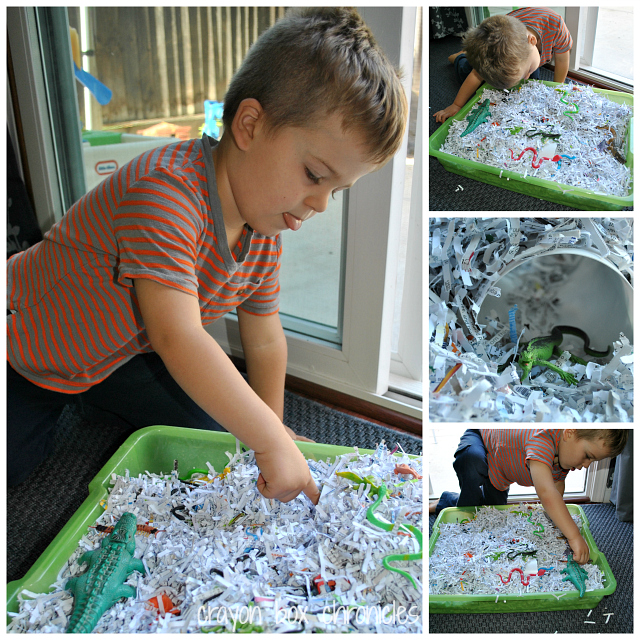 Reptile Shredded Paper Sensory Bin by Crayon Box Chronicles
