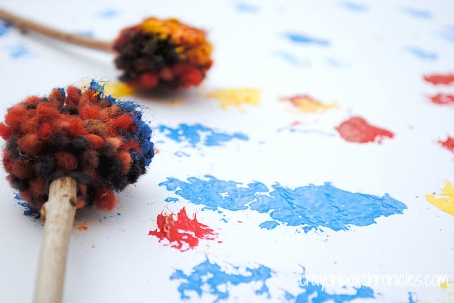 Yarn Pom Pom Drumstick Painting by Crayon Box Chronicles