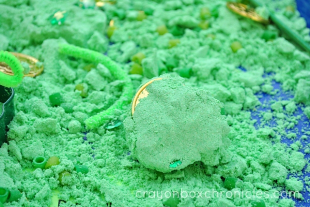 ball of green foam dough with coin
