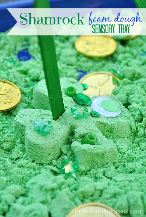 shamrock foam dough sensory tray with hidden shapes