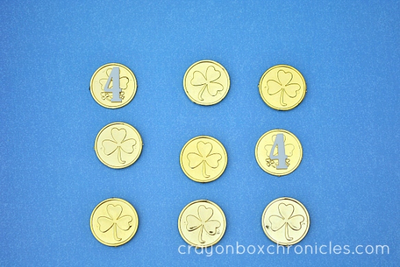 Kids memory match game with St Patty's Day coins